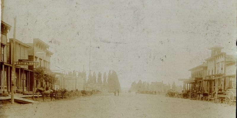 Sepia-toned image showing destruction in downtown Lakeview following a fire