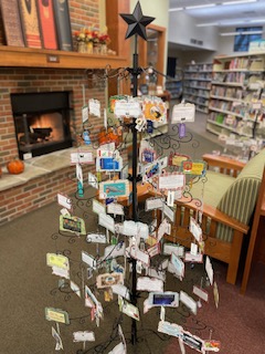 A Christmas Tree decorated with library cards