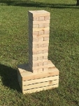Tumbling Timbers stacked up on the green yard