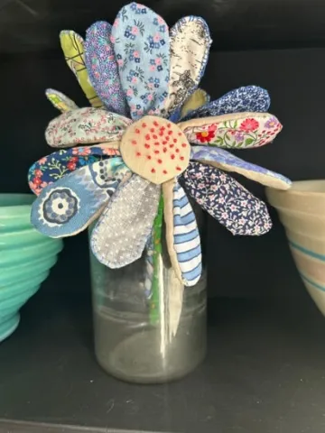 Scrappy Flower Craft made out of different fabric patterns to make petals.