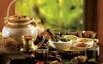 Ayurveda herbs in ceramic cups 
