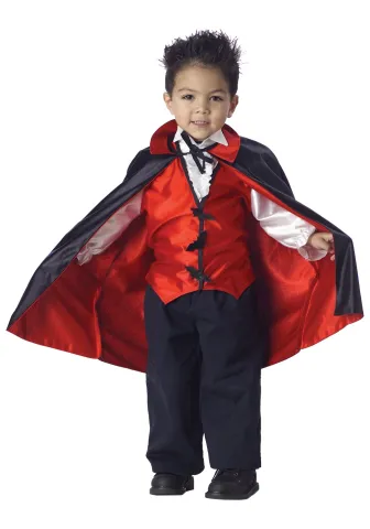 A little boy in the Vampire Halloween Costume 