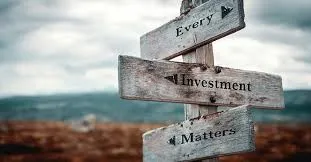 Road signs reading Every Investment Matters