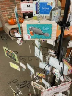 Library card with manatee 